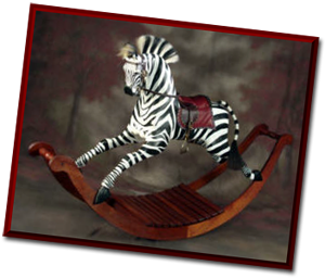 Zebra wooden rocking horse by Al Carr.
